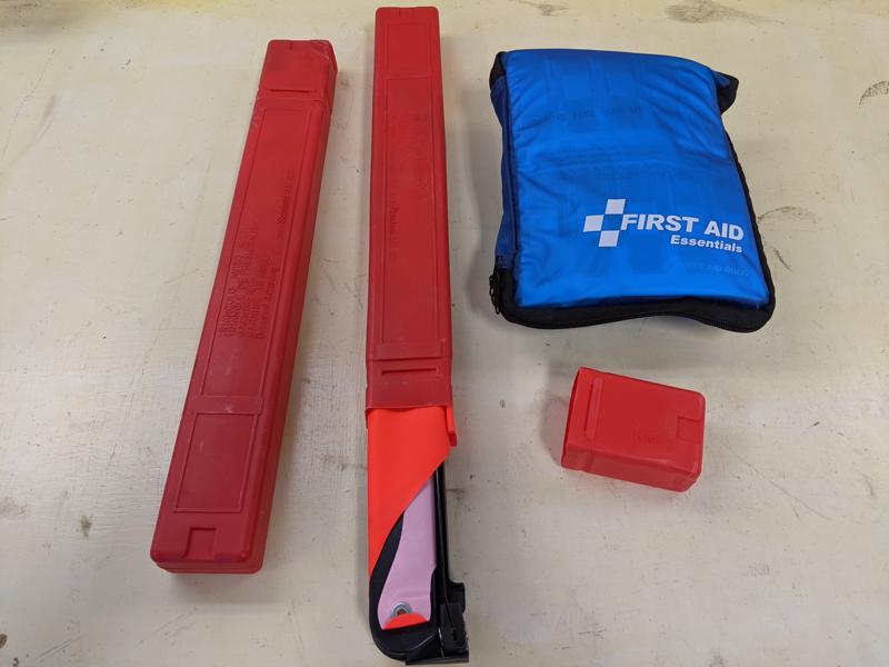 Emergency triangles and first aid kit