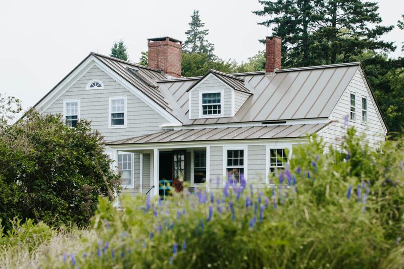 large house with wildflower meadow